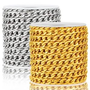 Detailed view of gold and silver plated curb chains on white spools for DIY jewelry making