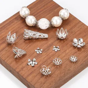 Detailed collection of silver hollow flower bead caps and DIY spacers for jewelry making