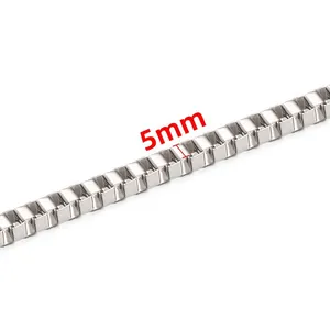 Close-up of 5mm polished stainless steel box chain showing high-gloss square links