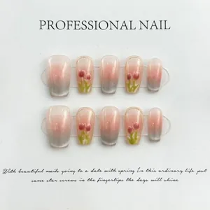 Detail of 10-piece press-on nails featuring tulip cat-eye and pink gradient patterns