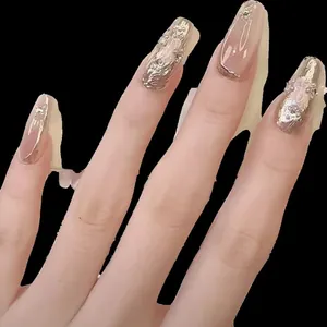 Handmade champagne gold liquid metal mirror powder press-on nails with 3D relief texture