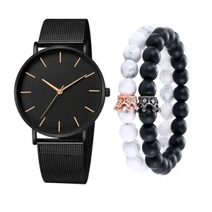 Minimalist black mesh watch with rose gold hands and two beaded crown bracelets set