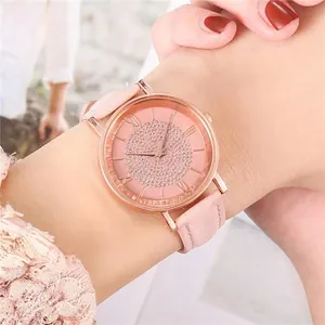 Pink suede quartz watch with rose gold case and sparkling crystal studded dial