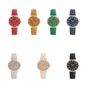 Detailed grid of quartz watches with colorful dials and carbon fiber texture straps
