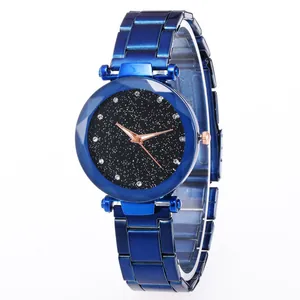 Women's quartz watch featuring blue steel strap and starry sky dial with crystal markers