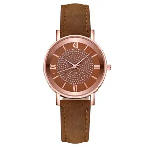 Macro detail of the starry brown dial with Roman numerals and rose gold watch case