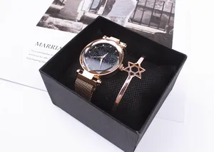 Rose gold starry sky watch with magnetic band and matching star bracelet in a gift box
