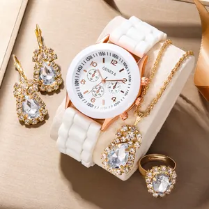Elegant 5-piece set with white silicone watch and rose gold gemstone jewelry on display