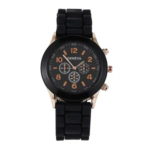 Minimalist quartz watch with rose gold case, black silicone strap and Geneva dial