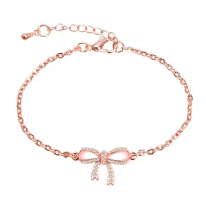 Elegant rose gold bow bracelet with sparkling cubic zirconia on minimalist link chain