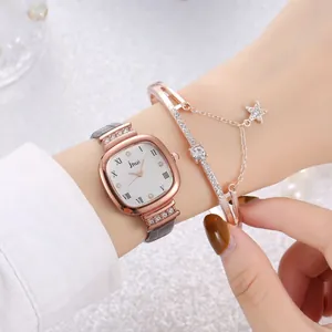 Elegant rose gold square watch with grey leather strap and star charm bracelet set