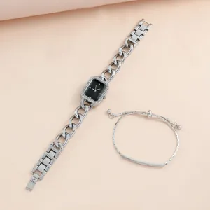 Elegant silver square watch with black dial and crystal bezel plus matching bracelet set