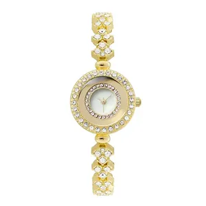 Orologio di lusso da donna in oro con cristalli incastonati e bracciale a catena elegante