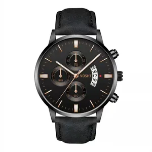 Detail view of the black chronograph watch face with rose gold indices and date window
