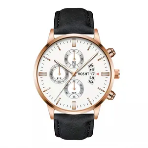 Detail view of rose gold men's chronograph watch with black leather strap and calendar