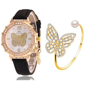 Détail d'une montre à quartz avec cadran papillon et ensemble de bracelet doré assorti