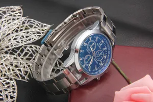 Detail of silver stainless steel chronograph watch with blue dial on gift box background