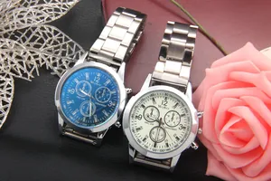Detailed close-up of quartz chronographs with stainless steel bands and blue glass