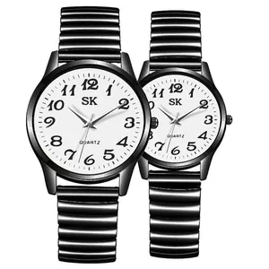 Quartz couple watch set with black elastic metal bands and large white numeric dials