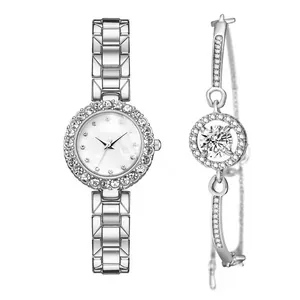 Detail of silver women's watch with rhinestone bezel and matching diamond bracelet