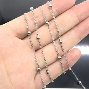 Silver stainless steel bead satellite chain held by hand for DIY jewelry making