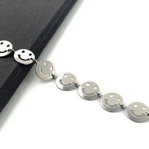 Polished silver stainless steel smiley face chain bracelet with hollow design