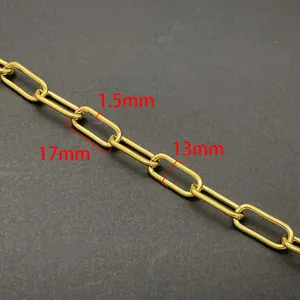 Macro detail of gold stainless steel oval cross chain with 1.5mm link width for DIY