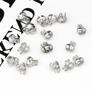 Macro shot of silver stainless steel clamshell bead tips for DIY jewelry making