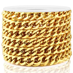 Close-up of golden stainless steel cuban curb chain on a white spool for DIY jewelry