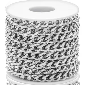 Close-up of shiny silver curb chain rolls in polished stainless steel for jewelry DIY