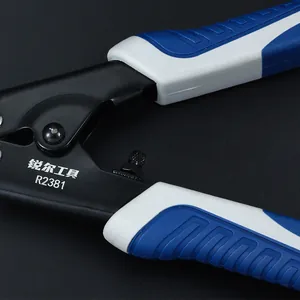 Detail view of the ergonomic blue and white handle and pivot on the steel cutter tool