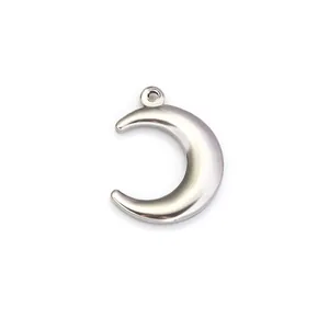 Detailed close-up of polished stainless steel crescent moon pendant with smooth finish