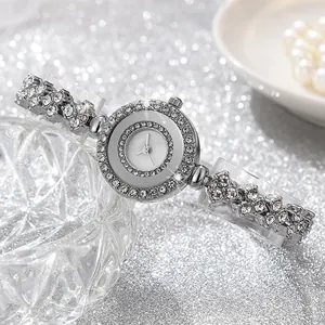 Elegante orologio da donna al quarzo argento con lunetta e cinturino decorati con strass