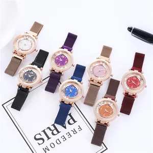 Group shot of stylish women's magnetic mesh watches with sparkling rhinestones and colorful dials