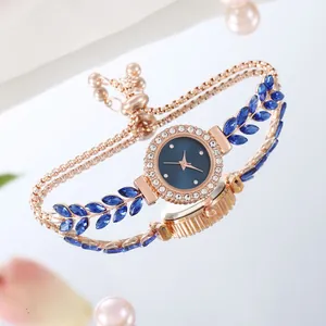 Detail of peacock green watch with leaf-shaped crystals and adjustable pull chain