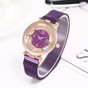 Detailed side view of purple starry sky watch dial with crystals and magnetic mesh band
