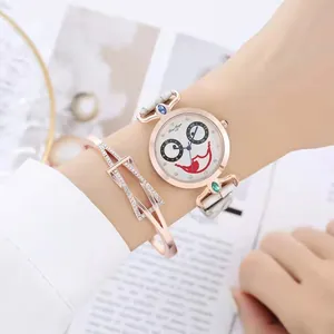 Close-up of Bao Diya rose gold lady watch with cartoon smiley face and geometric bracelet