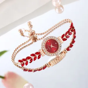 Detailed shot of rose gold jewelry watch with red leaf stones and adjustable beads