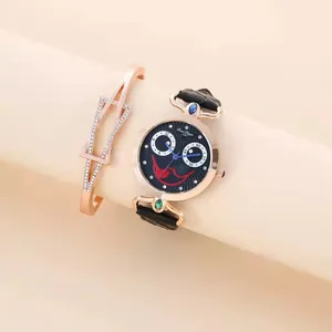 Detail of quartz watch with smiley face dial and rose gold geometric bracelet set