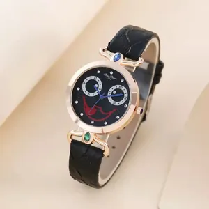 Detail of creative joker face watch dial with rose gold bezel and colorful gemstones