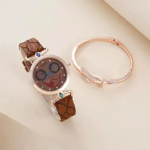 Elegant rose gold watch with brown leather strap and matching crystal open bangle set