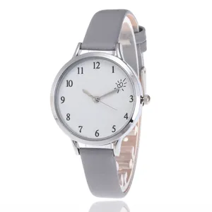 Macro view of minimalist grey leather strap and silver stainless steel watch case
