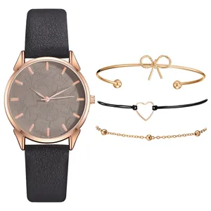 Orologio al quarzo da donna con set di 3 bracciali e quadrante con motivo floreale