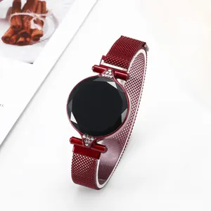 Detailed macro of burgundy mesh strap and faceted gemstone-cut dial for fashion watch