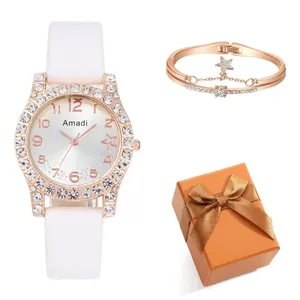 Coffret montre quartz femme et bracelet étoile avec strass brillants dans une boîte