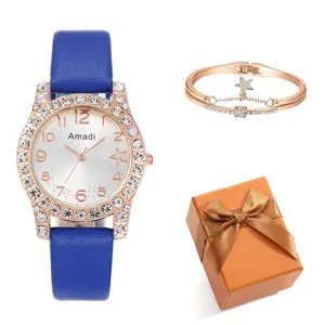 Montre en cuir bleu marine et bracelet étoile or rose dans un coffret cadeau