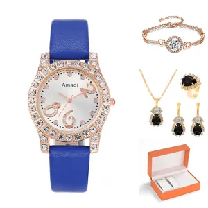 Set orologio da donna con cinturino in pelle blu, lunetta di strass e gioielli abbinati