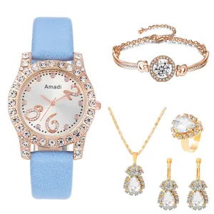 Set orologio e gioielli oro rosa cinque pezzi con cinturino in pelle celeste e strass
