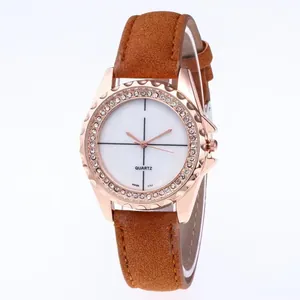 Women's quartz watch with crystal bezel, rose gold case, and brown frosted leather strap