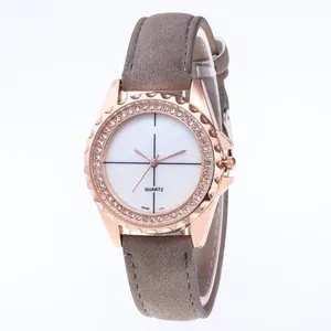 Minimalist quartz watch with rose gold diamond bezel and grey suede strap for women
